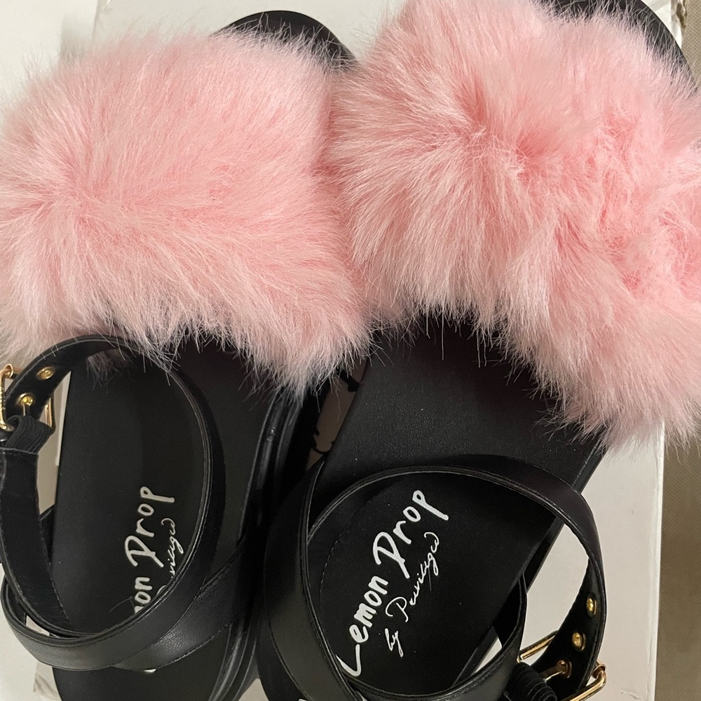 black and pink buckle platforms